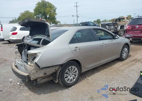 2014 Toyota Camry Le z USA, uszkodzony, nr VIN 4T4BF1FK5ER384087